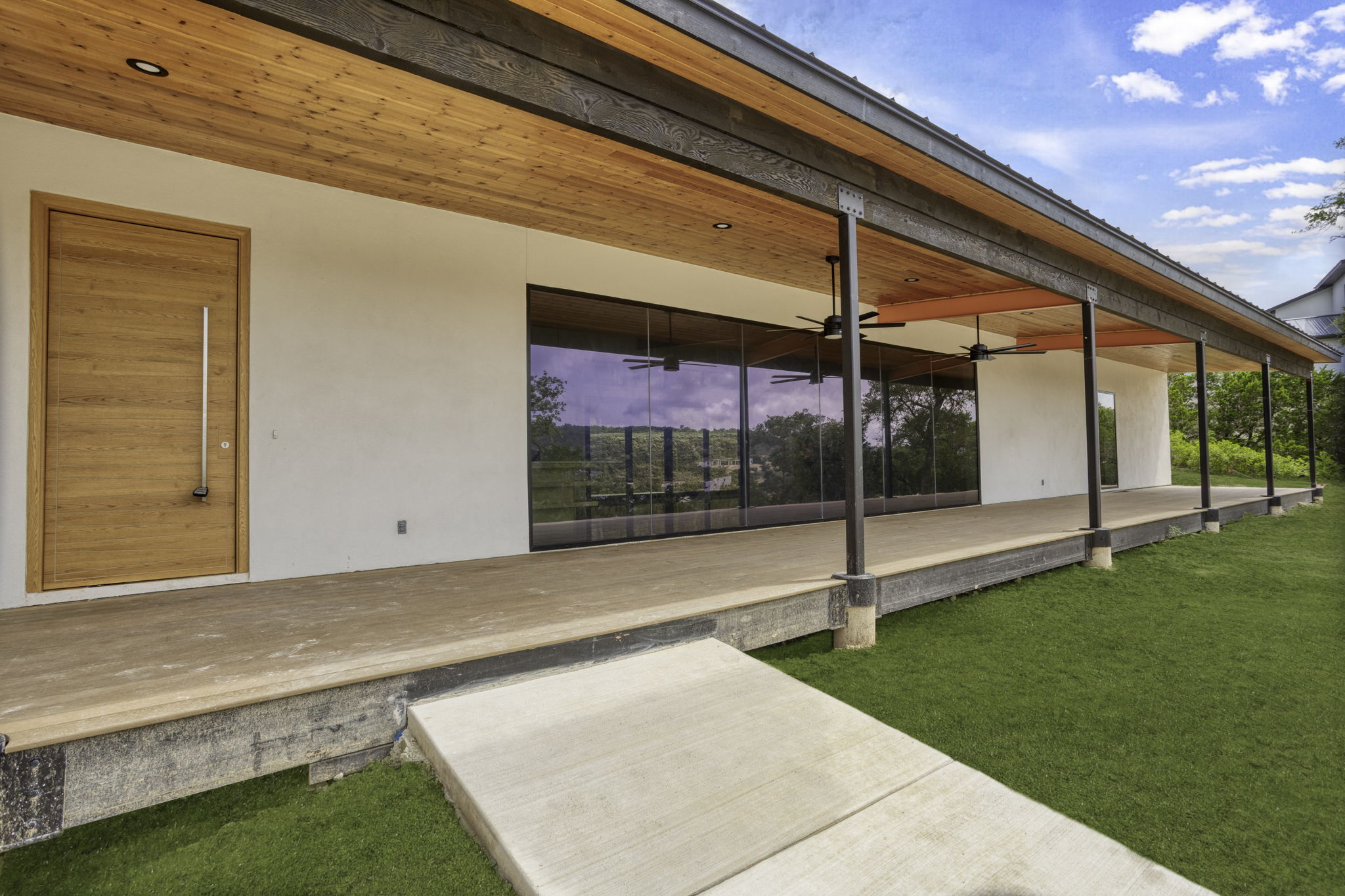 Laminated frameless window wall